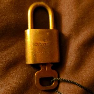 LV. LOCK WITH KEY